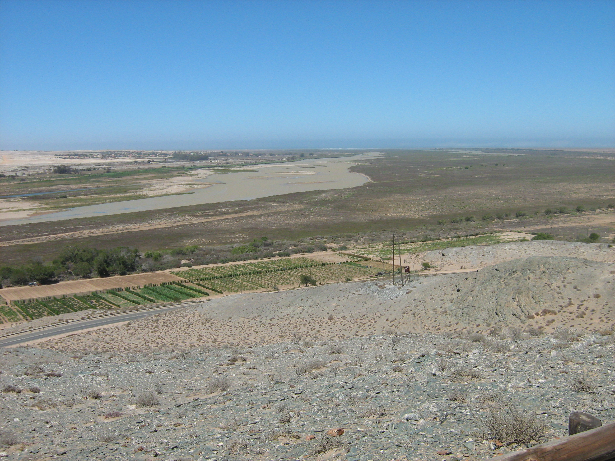 View of the Orange River Mouth from Swartkop looking west.  The river mouth is in the centre of the picture.