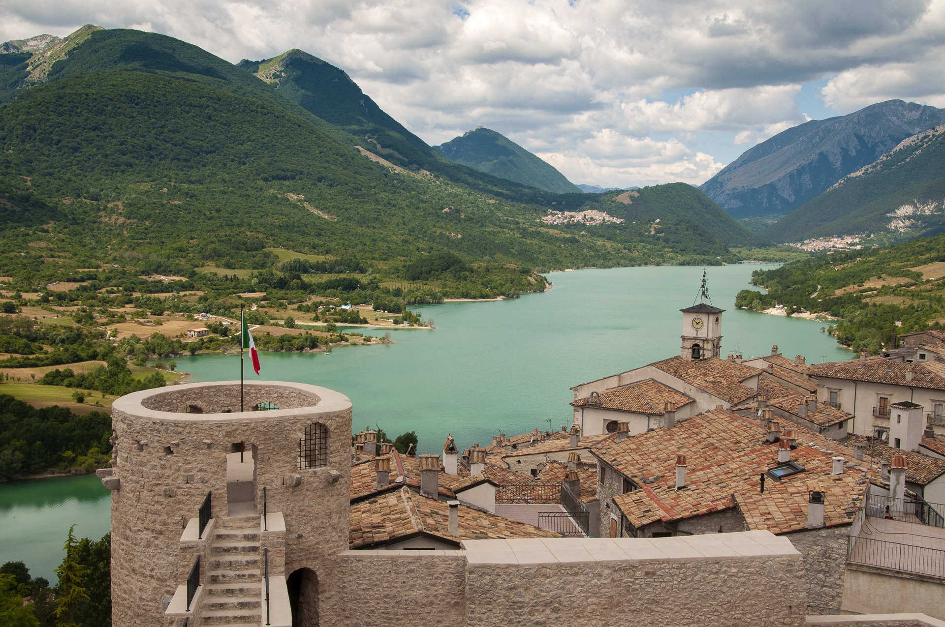 Barrea Lake from the village of Barrea. In the background the village of Civitella Alfedana far centre and Villetta Barrea far right