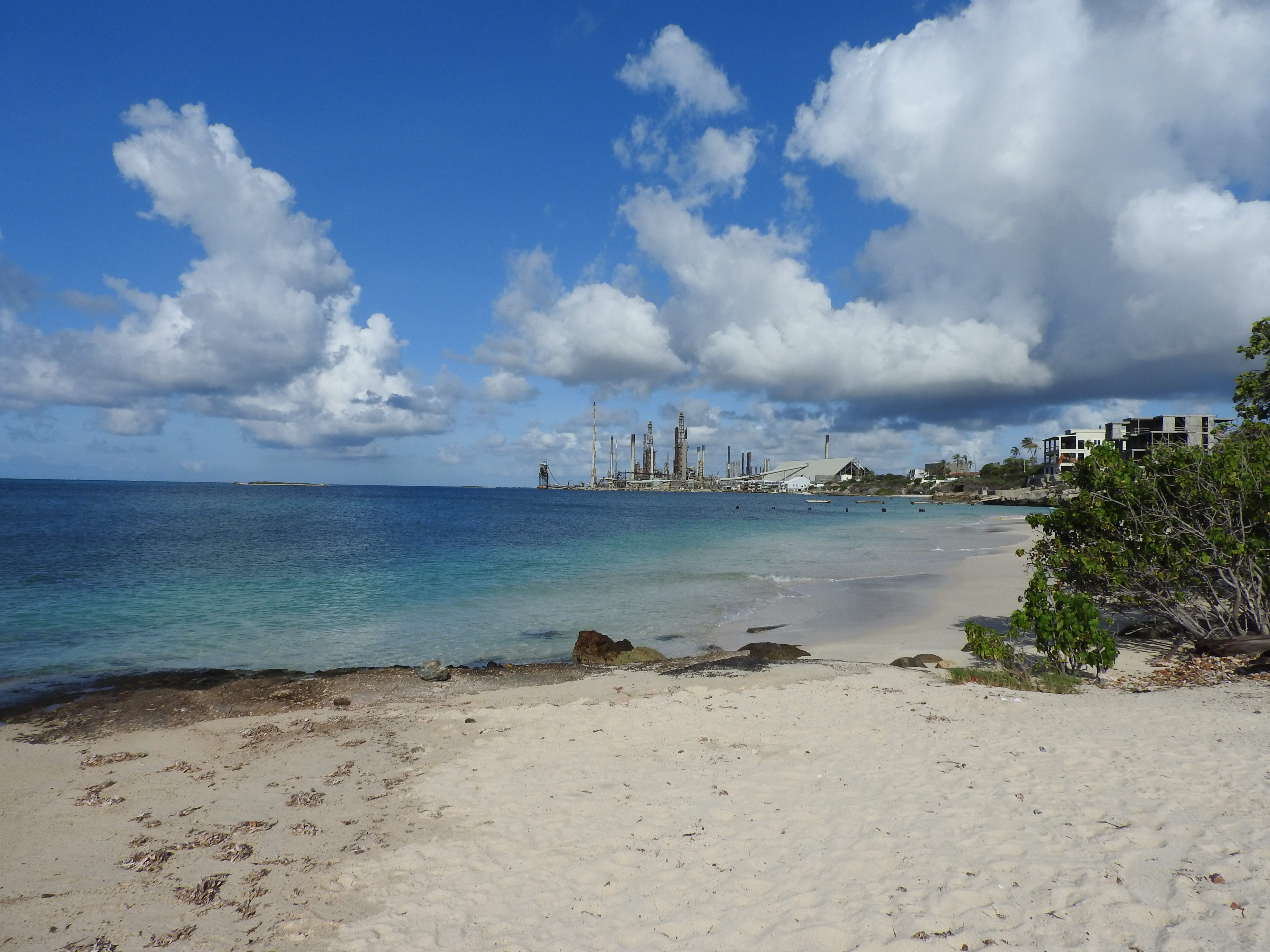 One of the turtle nesting beaches in front and the harbour area at San Nicolas in the back.