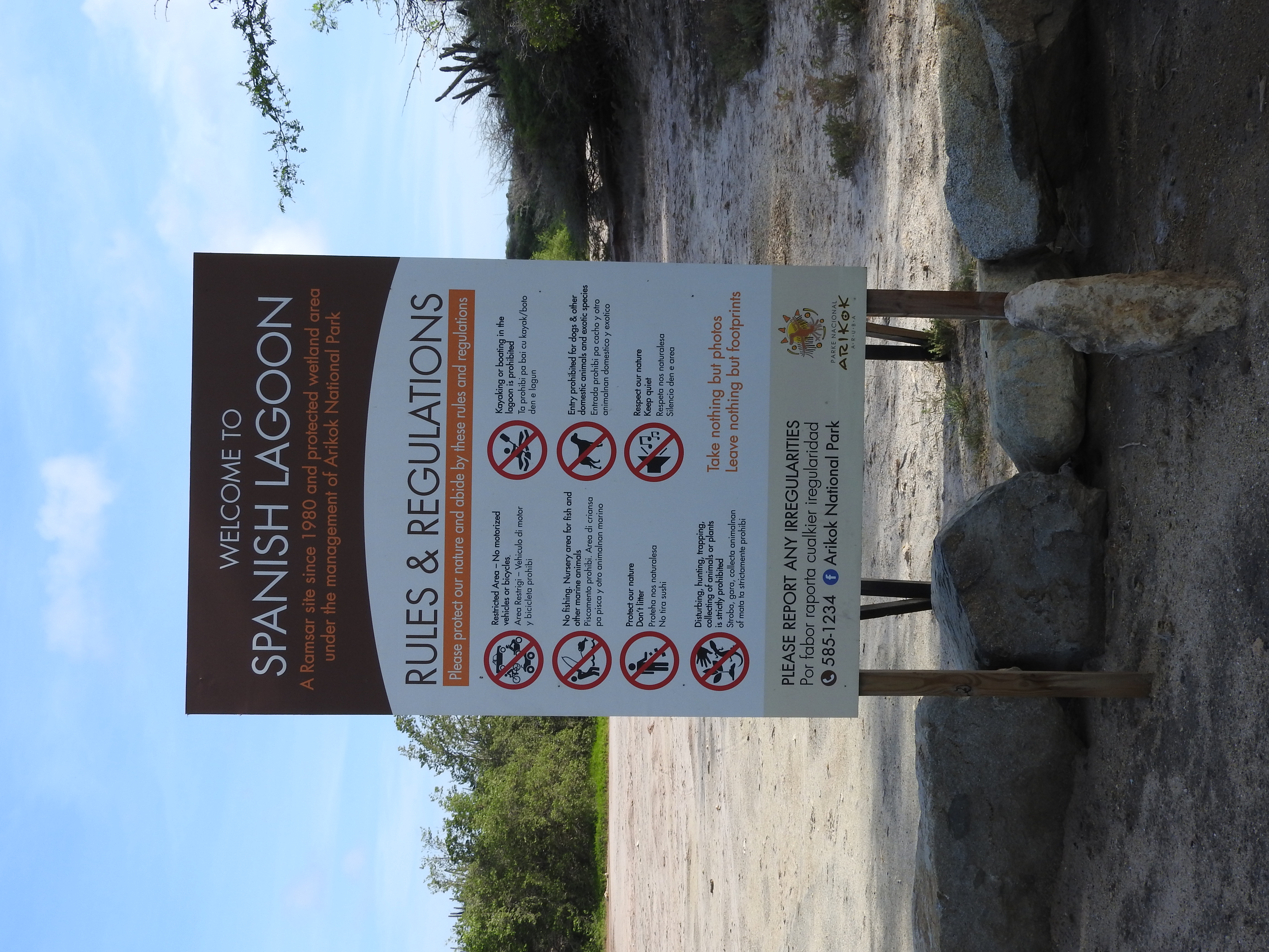 English language information panel informing tourists about the rules and regulations at Ramsar site Spaans Lagoen.