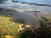 Aerial view of the Pitt Water-Orielton Lagoon Ramsar Site. Photo by Jim Mollison. Date unknown.