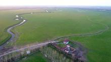 South east area of Anzali Wetland. Keshurud River,pasture (seasonal wetland) and reed bed of Chokum Wildlife Refuge are seen. The building with red roof is Anzali Wetland Eco Tourism Center. 